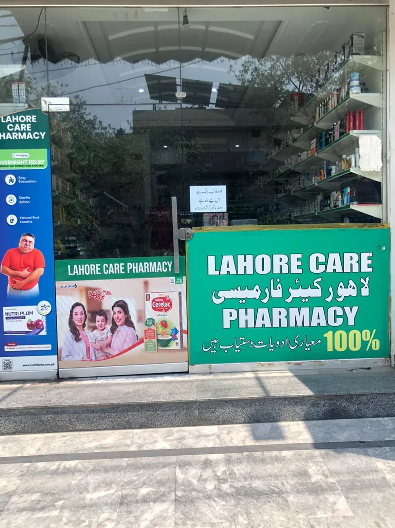 The Lahore Care Pharmacy shopfront with its green sign